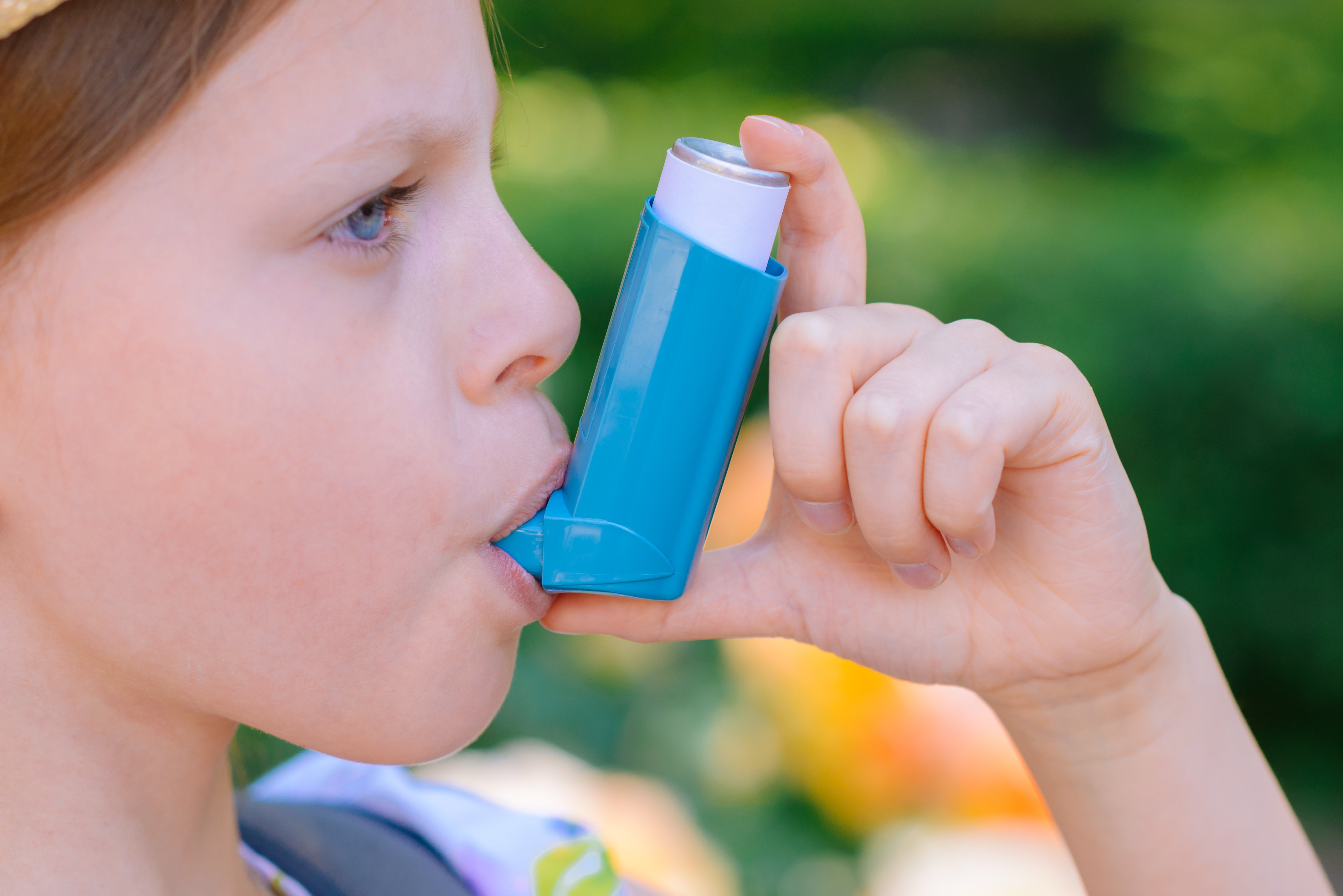 bigstock-Girl-Having-Asthma-Using-Asthm-347251351
