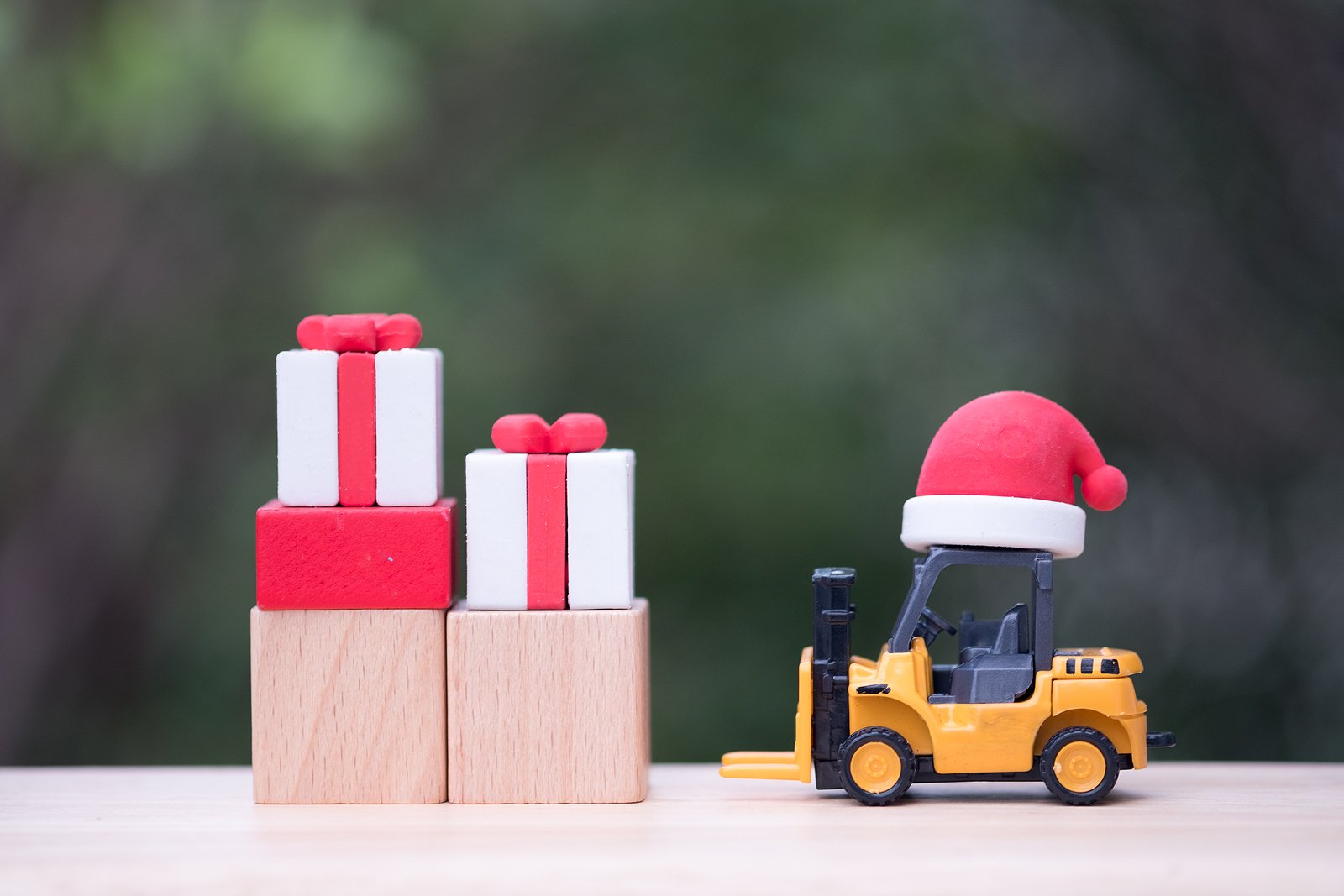 bigstock-Hat-Santa-Put-On-Toy-Forklift--275676133