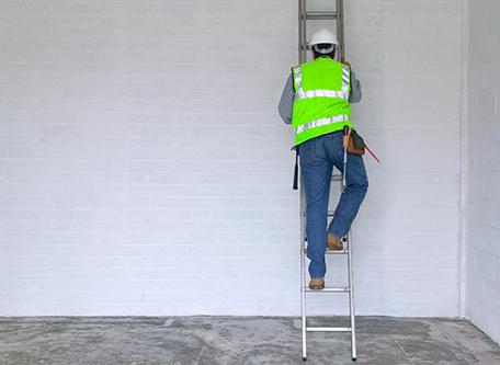 contractor on a ladder